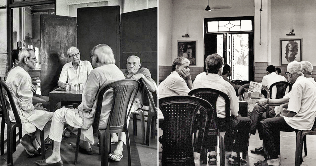 A lively intellectual Adda session at the historic Indian Coffee House in Kolkata with people drinking tea and debating literature